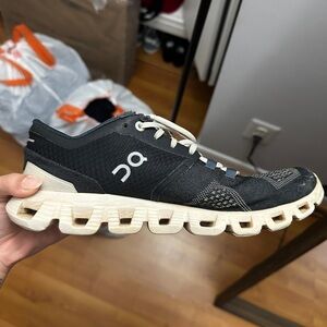 On Running Black and Cream Athletic Shoes